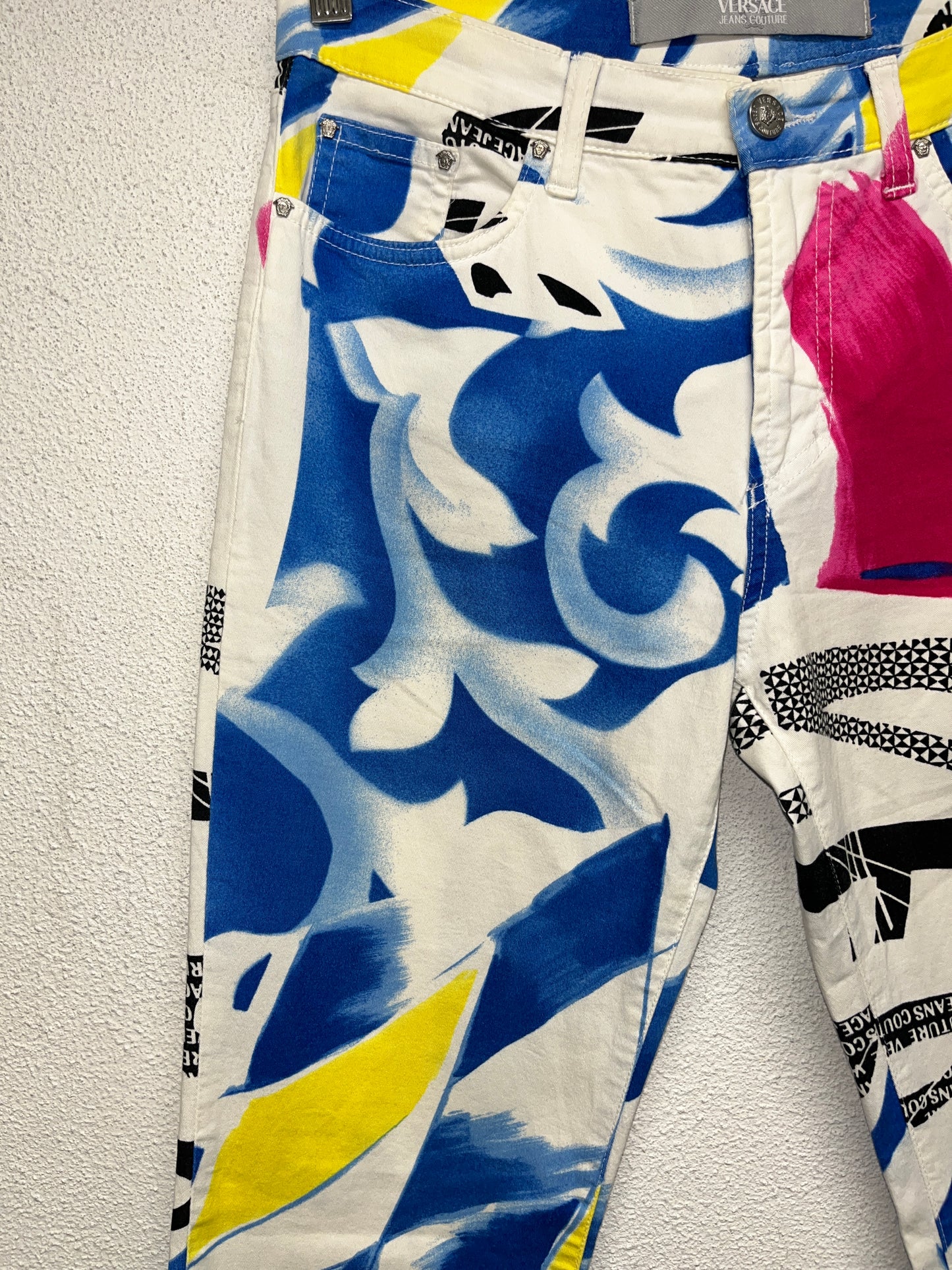 VERSACE stencil effect print trousers (M)