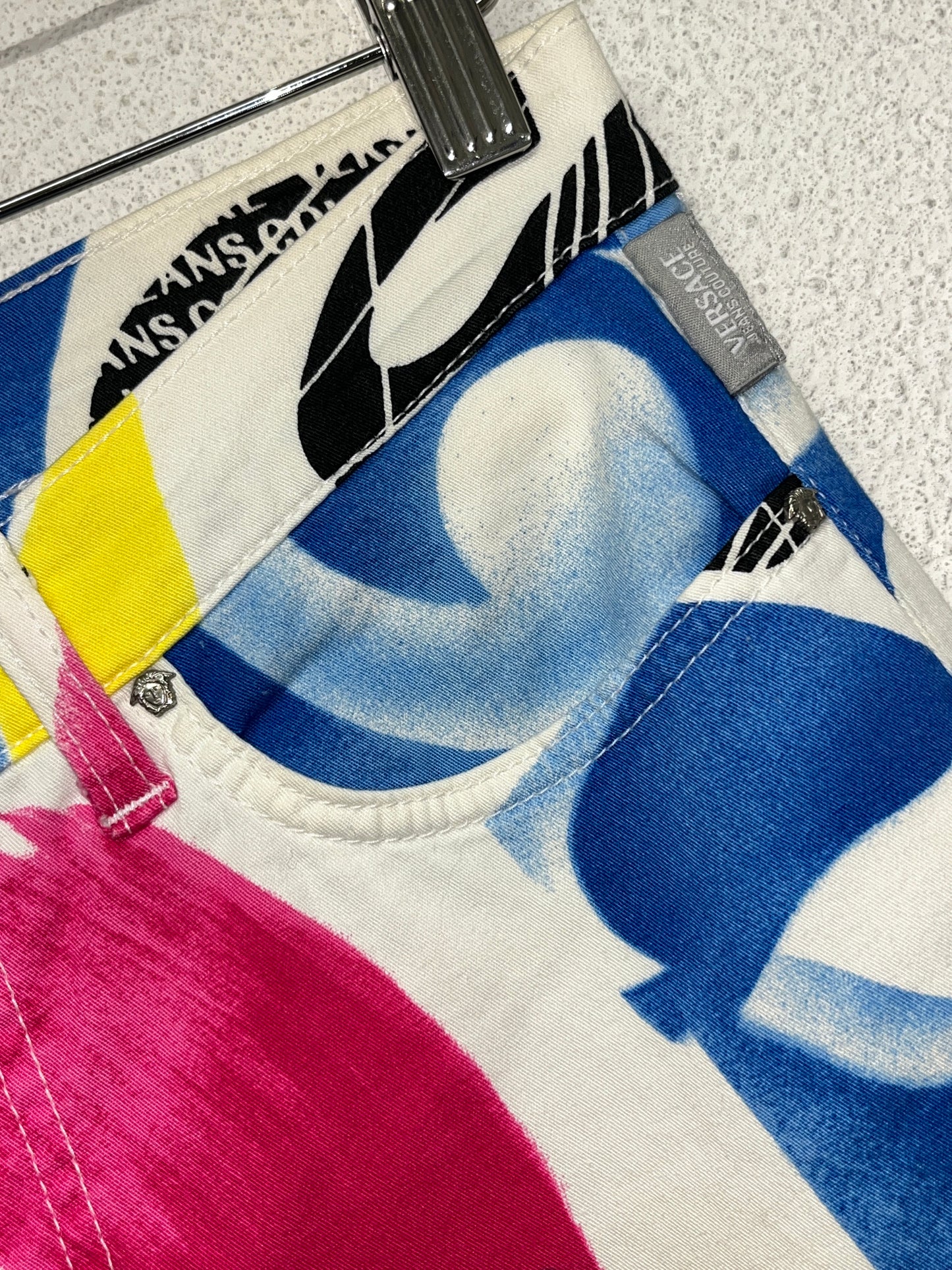 VERSACE stencil effect print trousers (M)