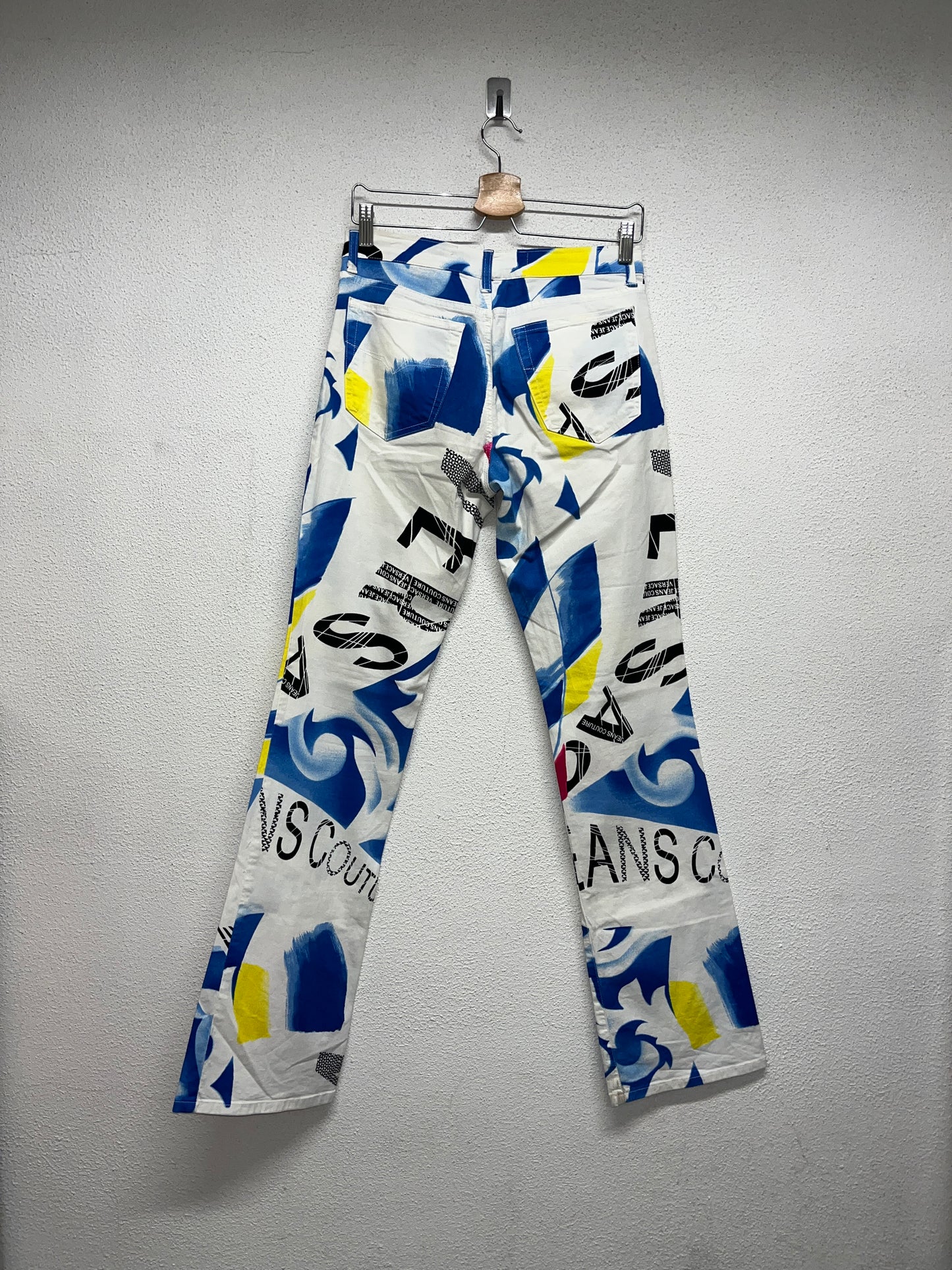 VERSACE stencil effect print trousers (M)