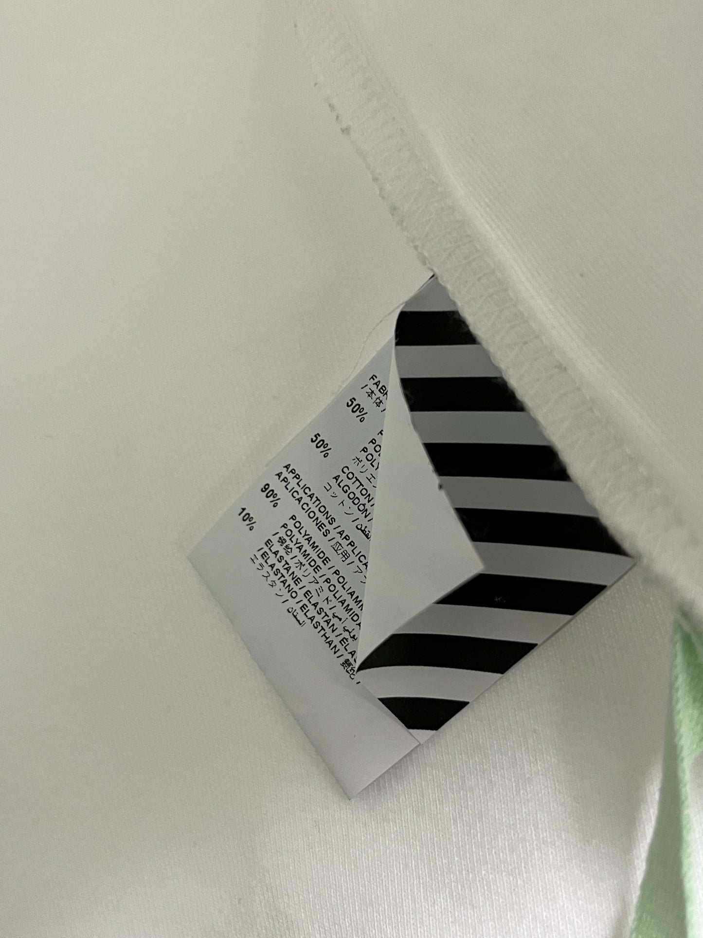 OFF-WHITE by Virgil Abloh rare white 'Nebraska' v-neck graphic jersey t-shirt (XL)