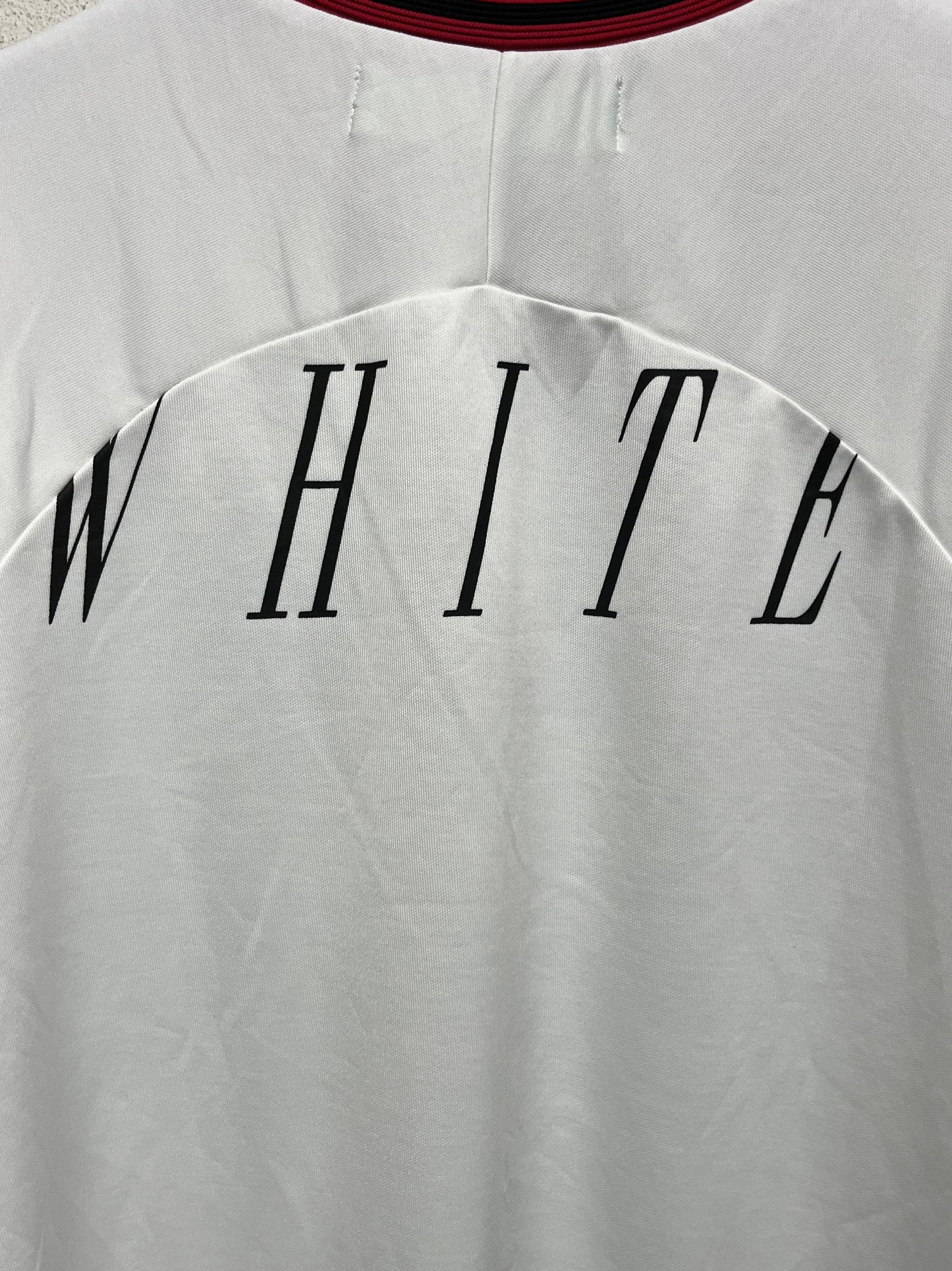 OFF-WHITE by Virgil Abloh rare white 'Nebraska' v-neck graphic jersey t-shirt (XL)