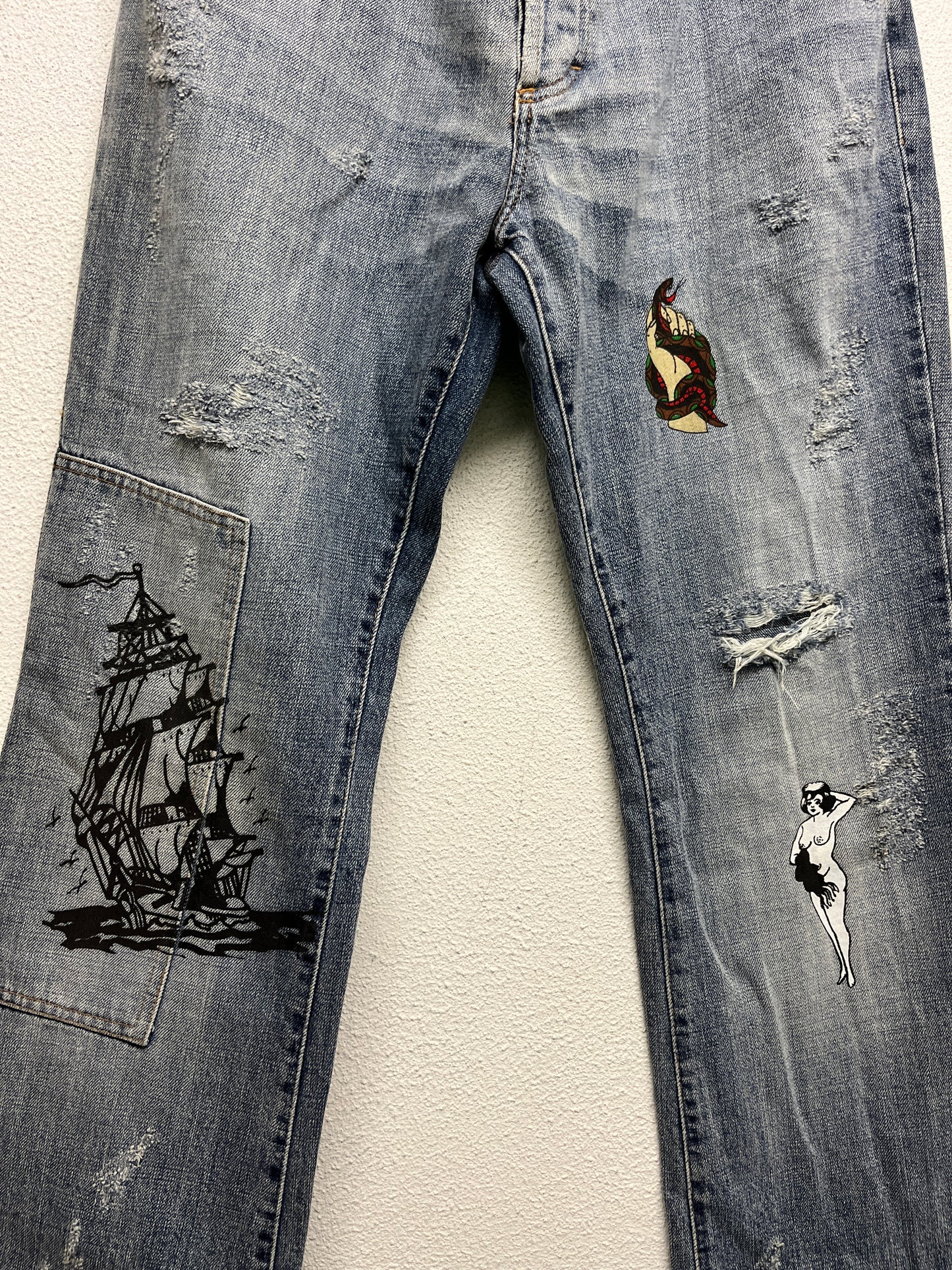 ROBERTO CAVALLI just cavalli tattoo graphic distressed denim bootcut trousers (M)