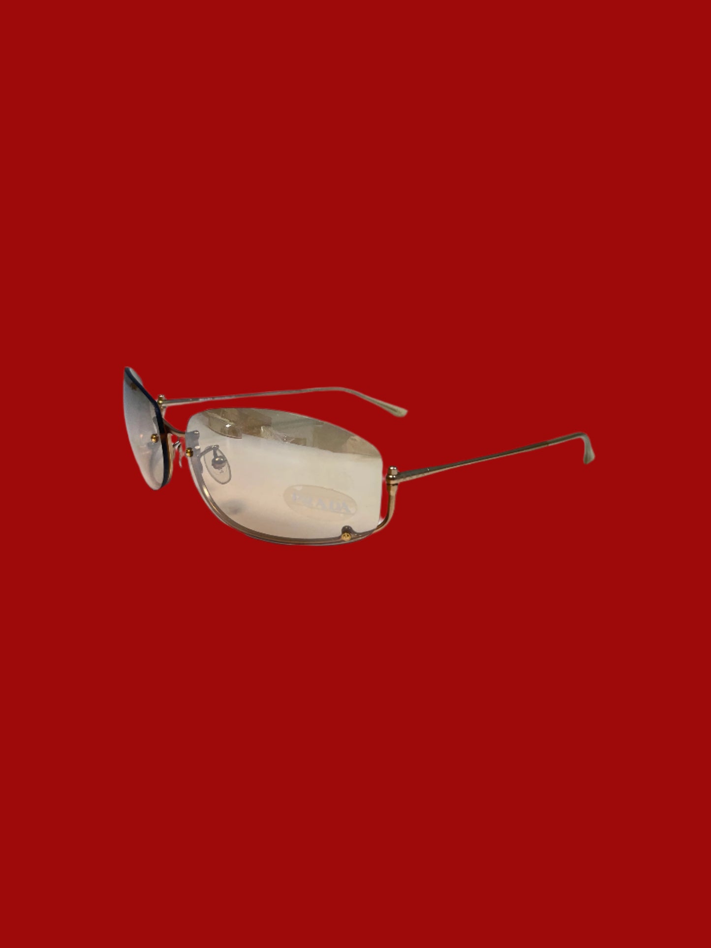 PRADA inverted rose-gold sunglasses