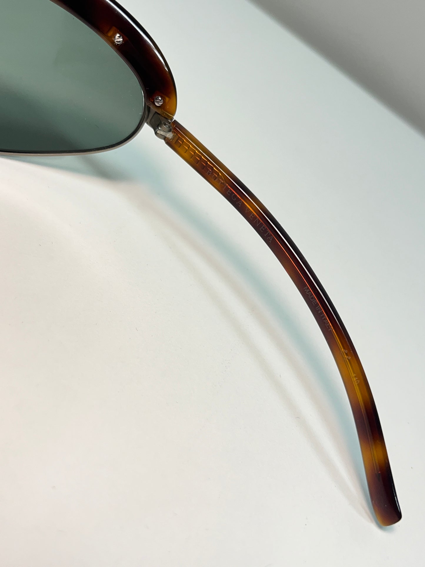 BOTTEGA VENETTA turtle shell pattern oval oversize studed sunglasses
