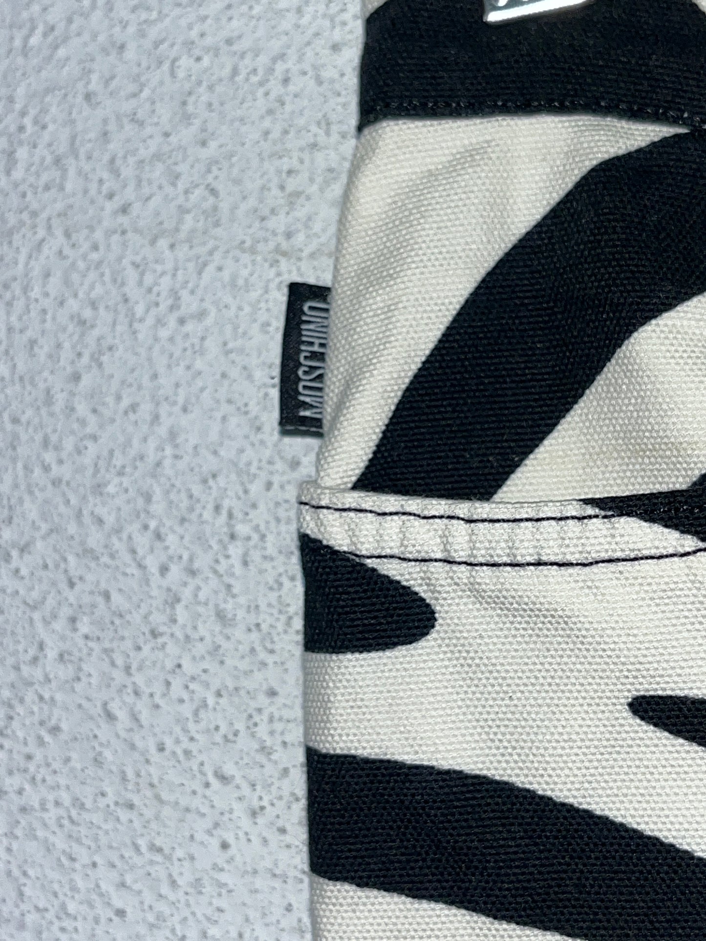 MOSCHINO zebra print bootcut trousers (S)