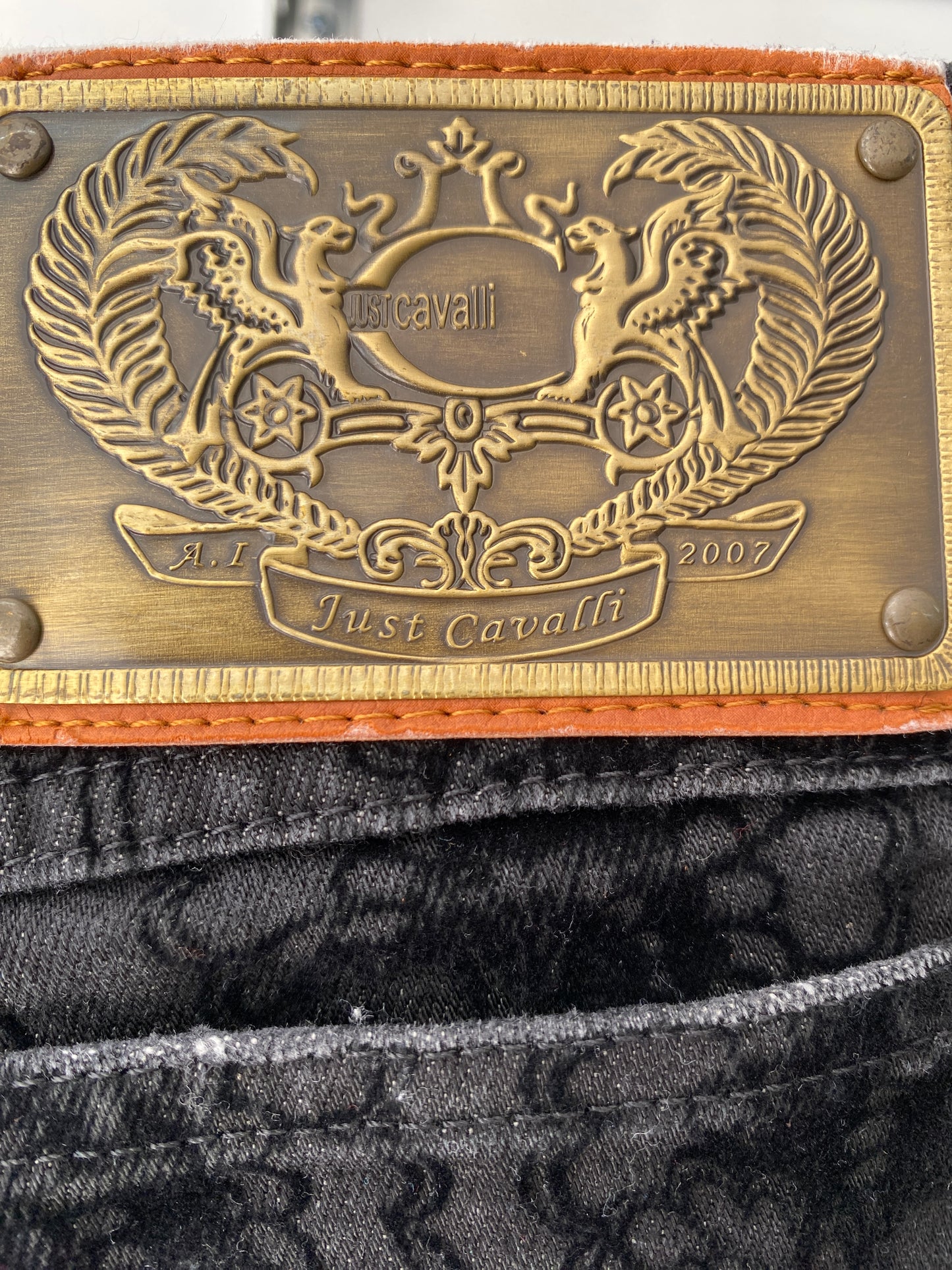 ROBERTO CAVALLI black flower motif jeans (XS)