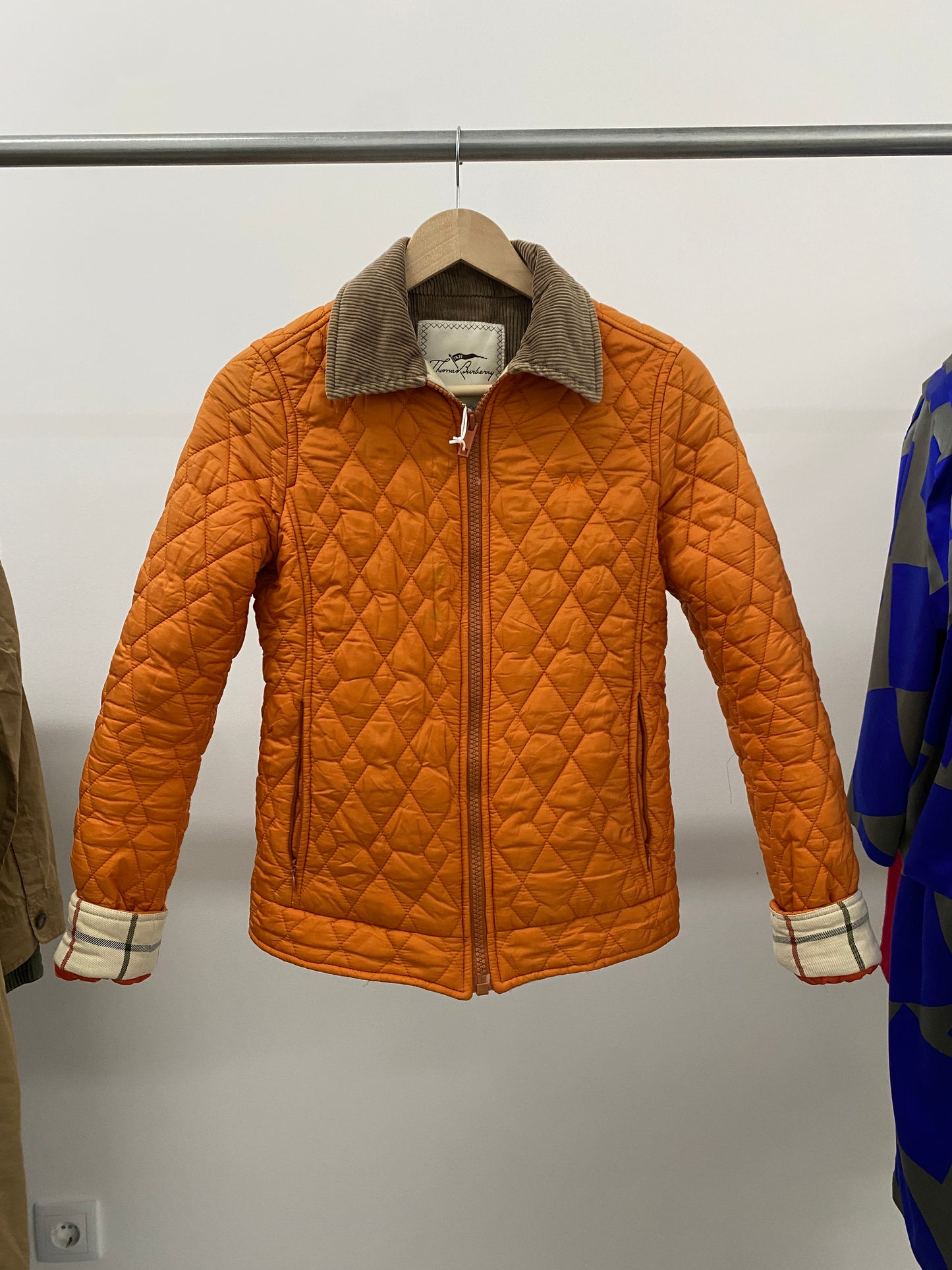 BURBERRY orange puffer (XS)