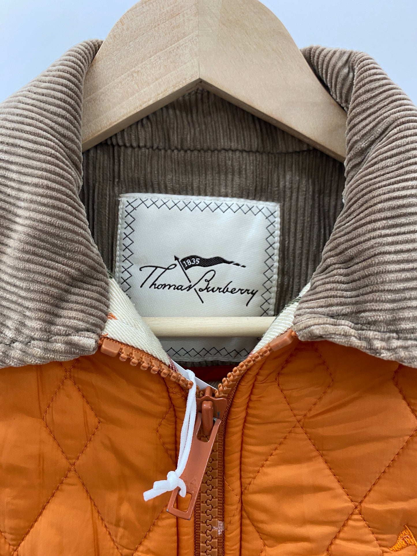 BURBERRY orange puffer (XS)