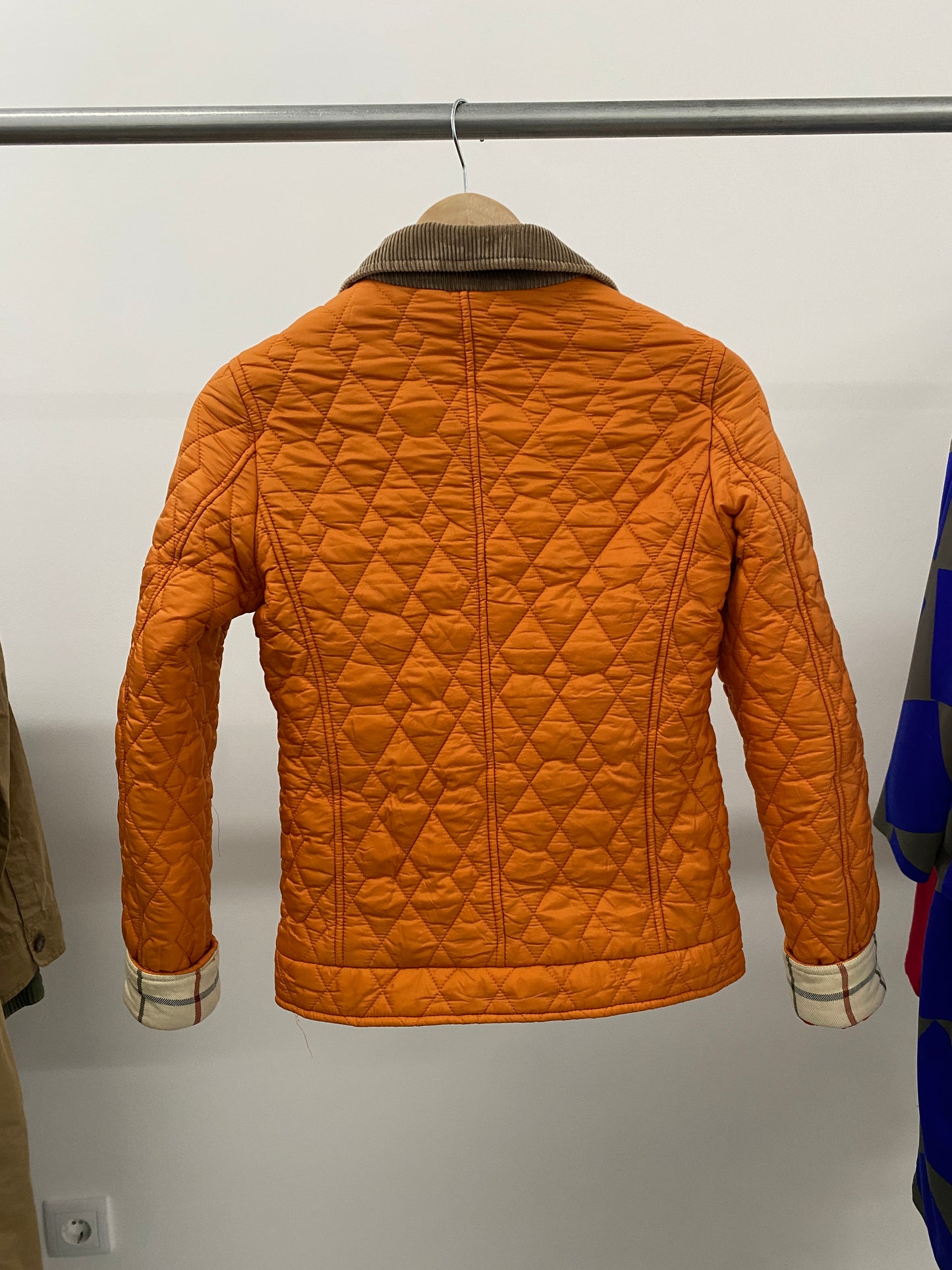 BURBERRY orange puffer (XS)