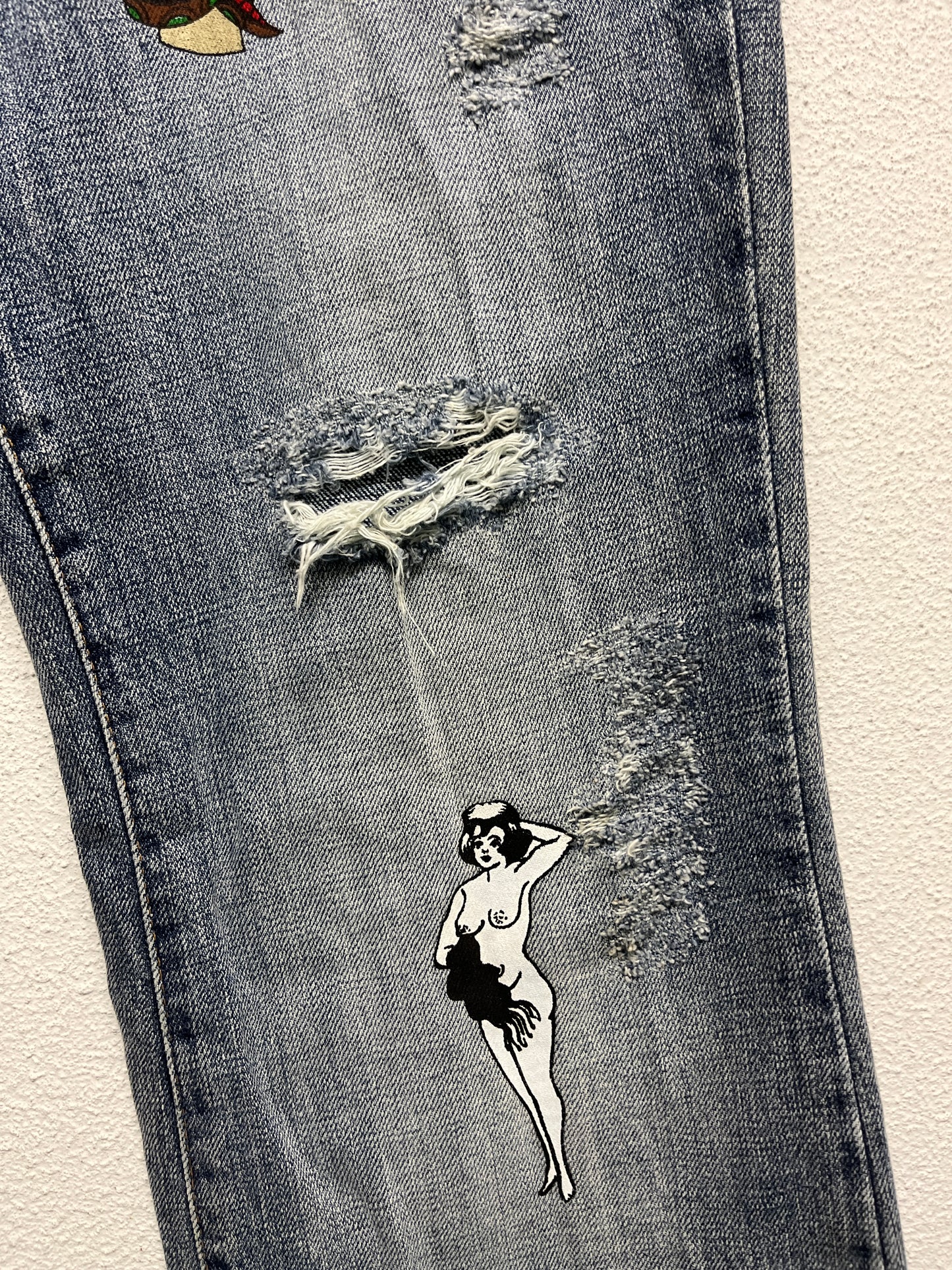 ROBERTO CAVALLI just cavalli tattoo graphic distressed denim bootcut trousers (M)