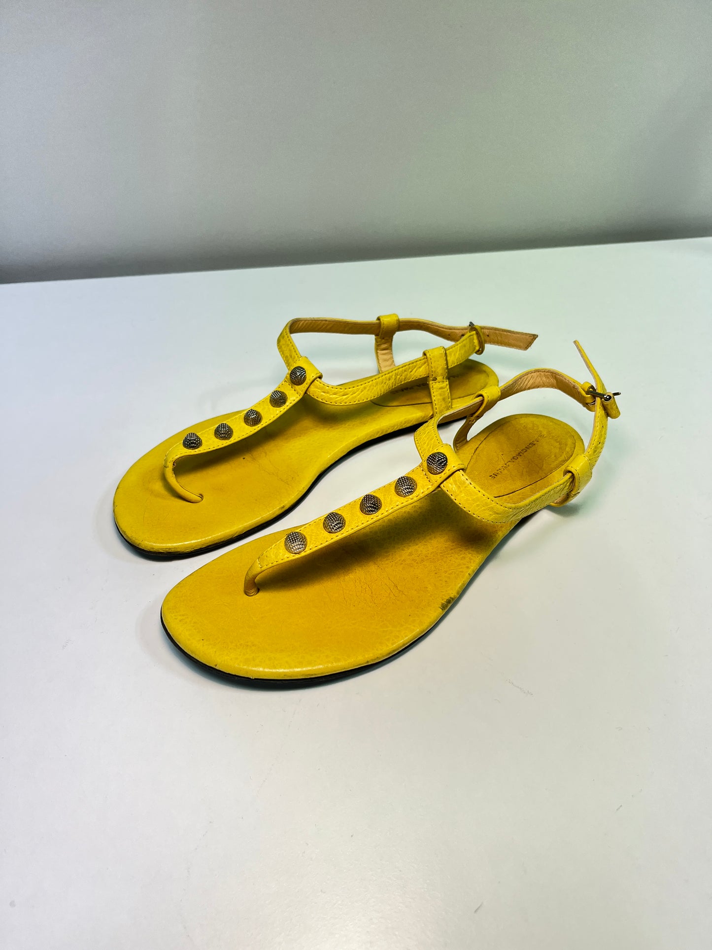BALENCIAGA yellow leather studded flat sandals (38)