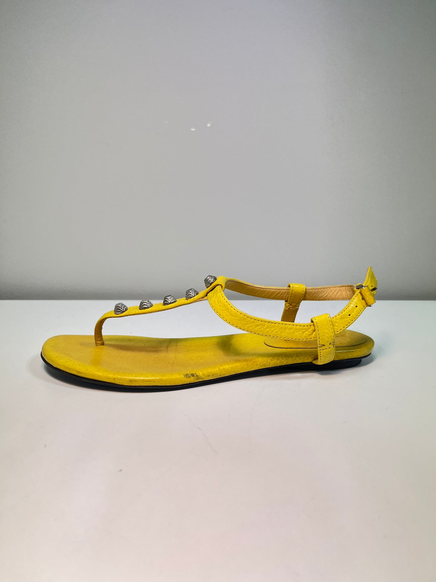 BALENCIAGA yellow leather studded flat sandals (38)
