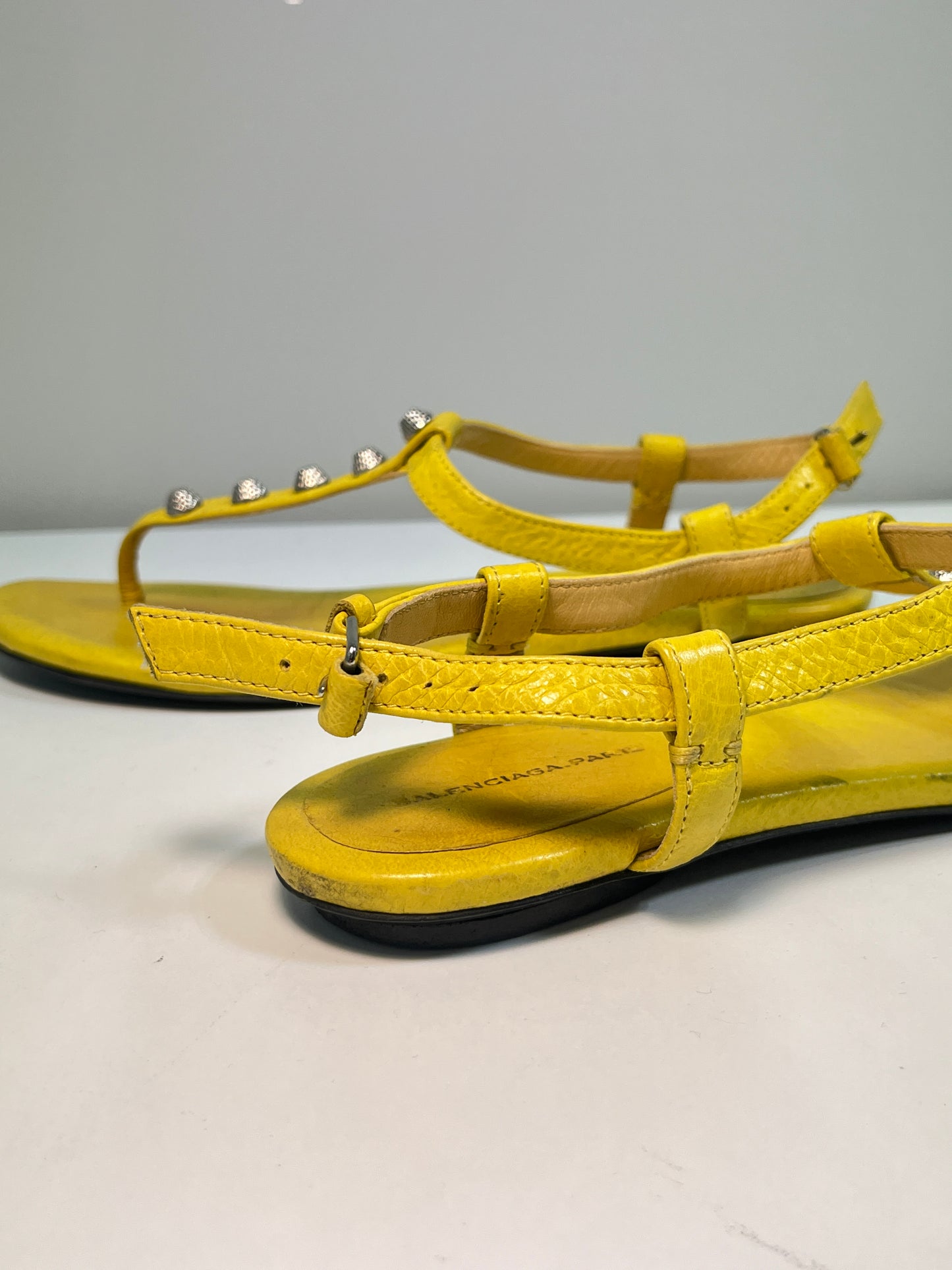 BALENCIAGA yellow leather studded flat sandals (38)