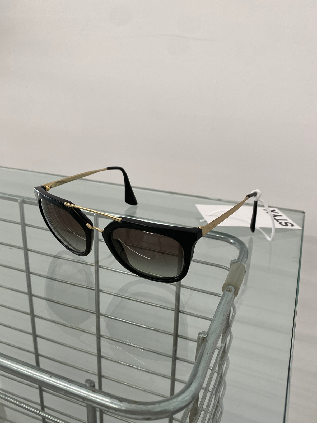 Prada black and gold sunglasses