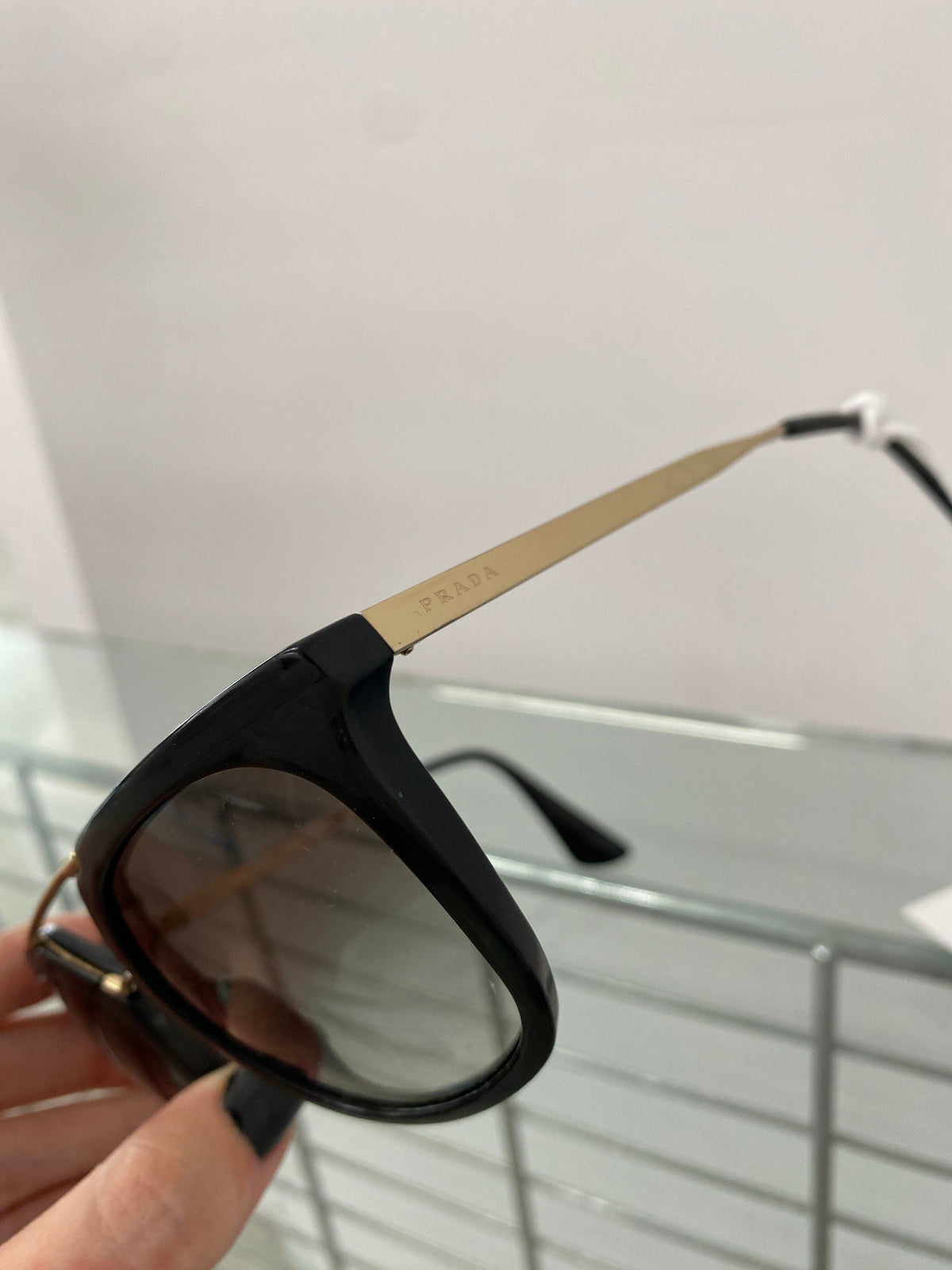 Prada black and gold sunglasses