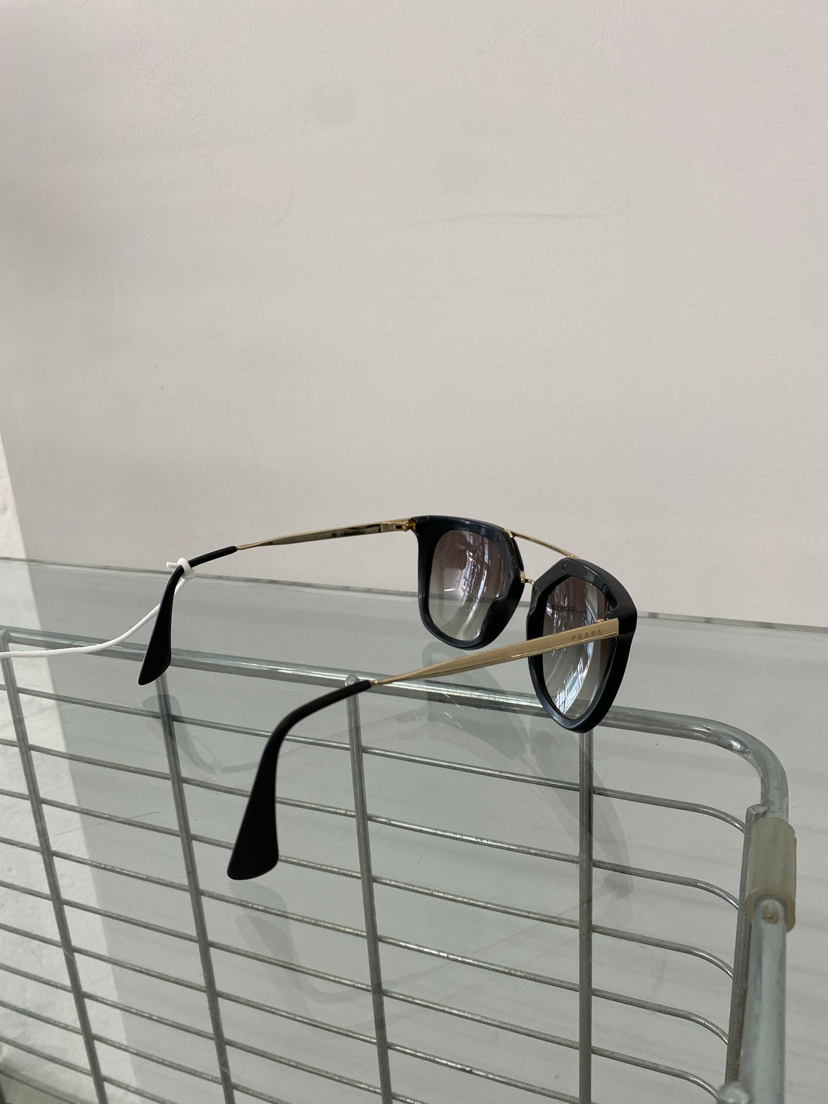 Prada black and gold sunglasses