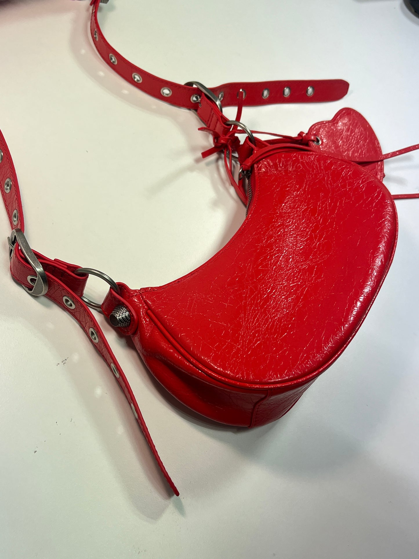 BALENCIAGA Le Cagole mini red leather studded bag