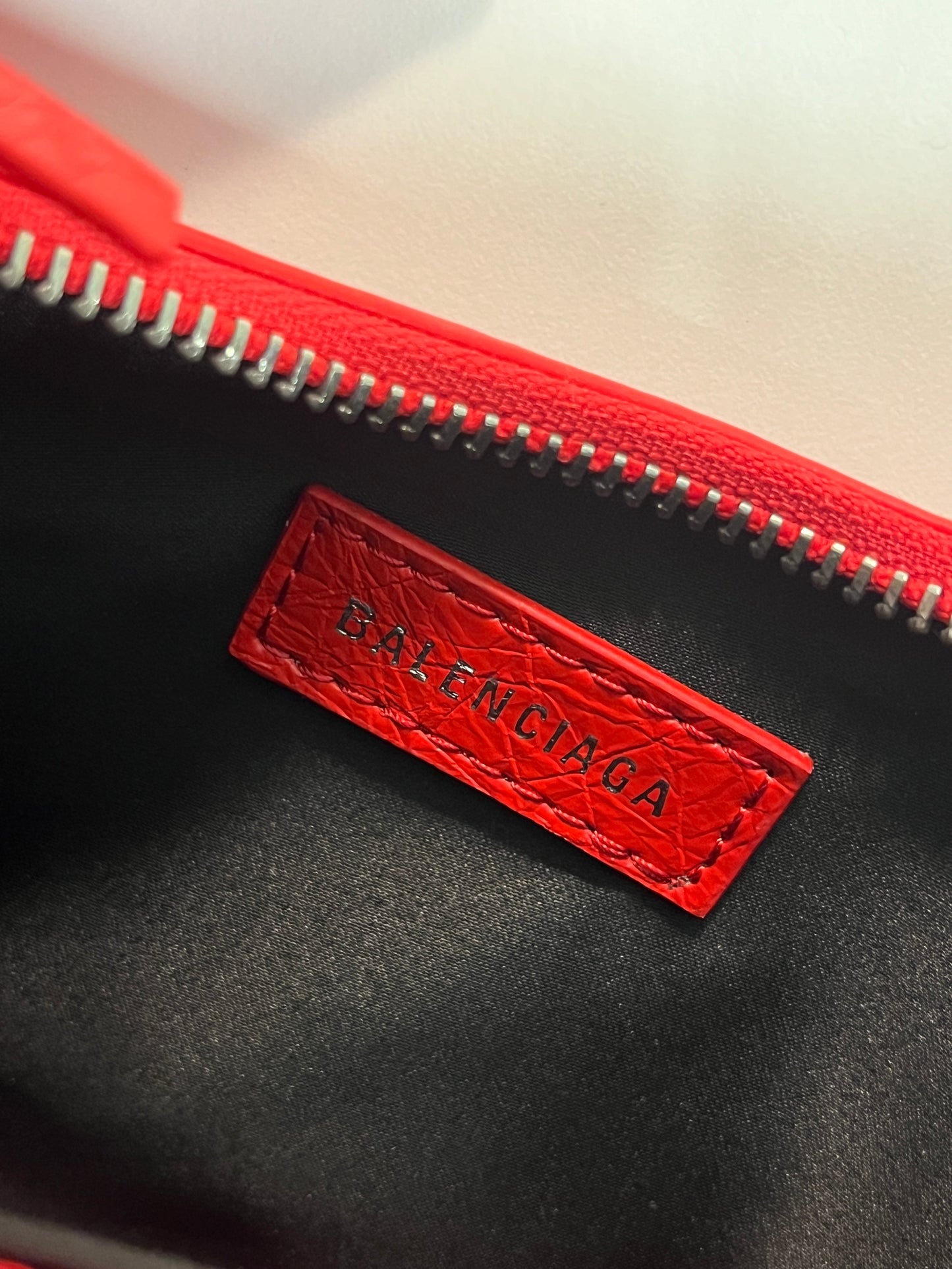 BALENCIAGA Le Cagole mini red leather studded bag