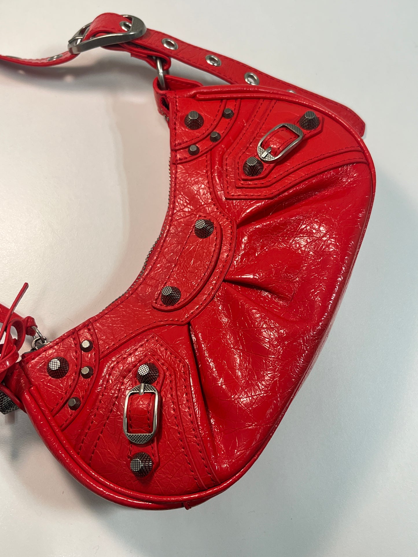 BALENCIAGA Le Cagole mini red leather studded bag