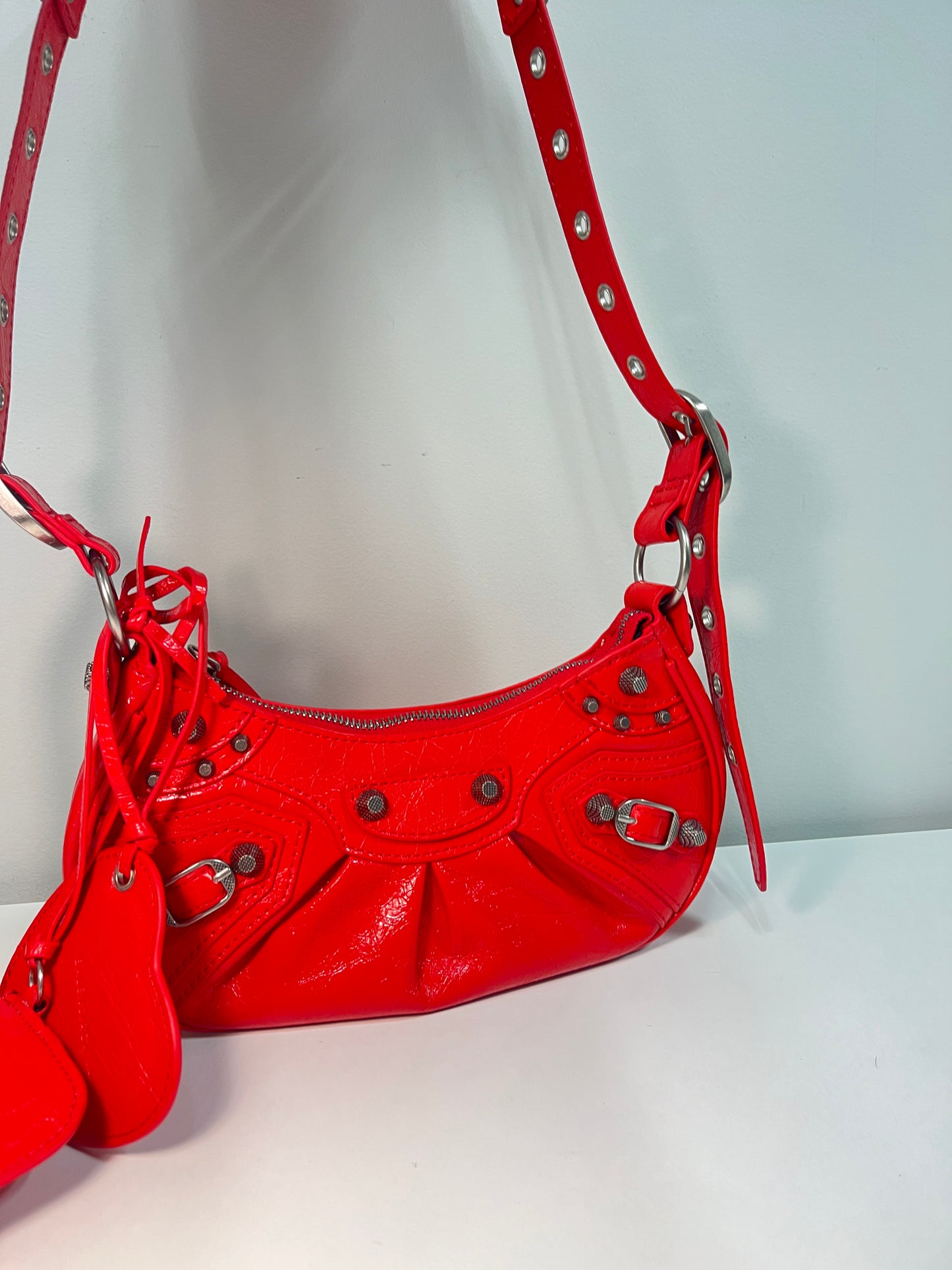 BALENCIAGA Le Cagole mini red leather studded bag